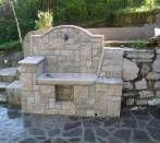 Fountain in draft of travertine